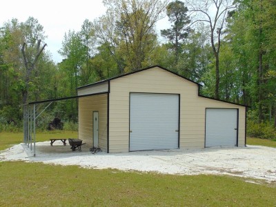 Enclosed Steel Barn | Boxed Eave Roof | 42W x 21L x 12H | Raised Center Aisle 